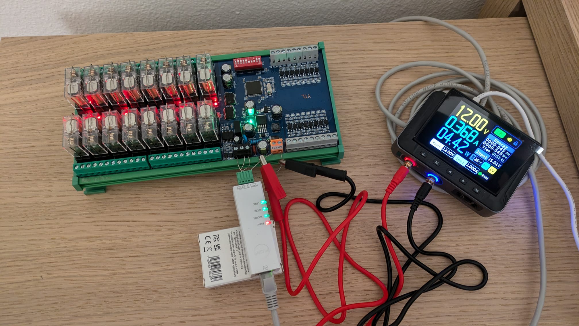 The 16 channel module under test. The small white unit is the Modbus adapter.