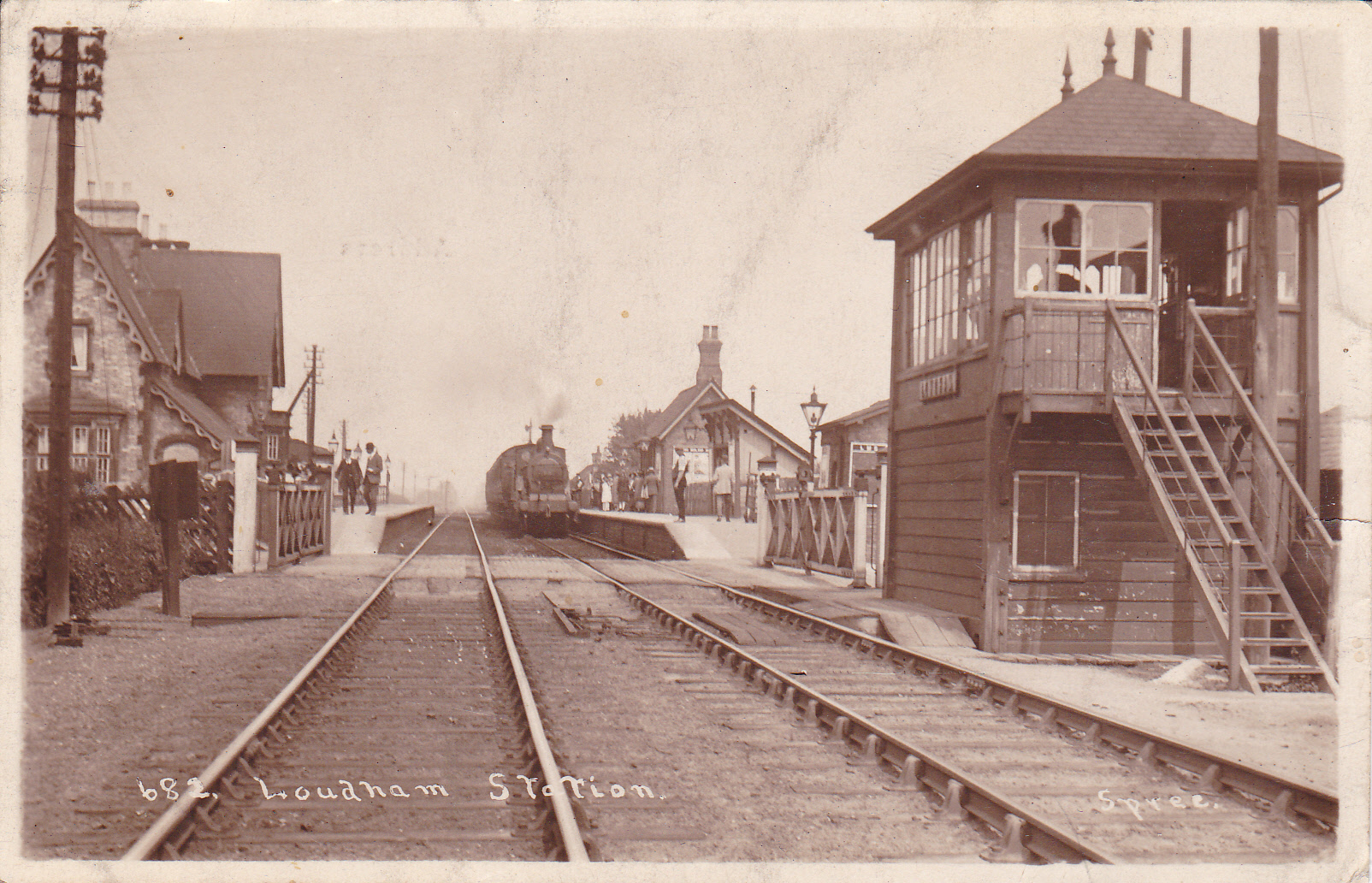 1932 sepia photograph of Lowdham station and signal box.